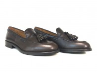 Mocassino con nappine in pelle testa di moro